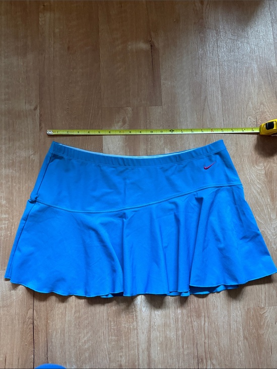 Nike Dresses & Skirts - NWT Nike Blue Tennis Skirt with Pink Swoosh